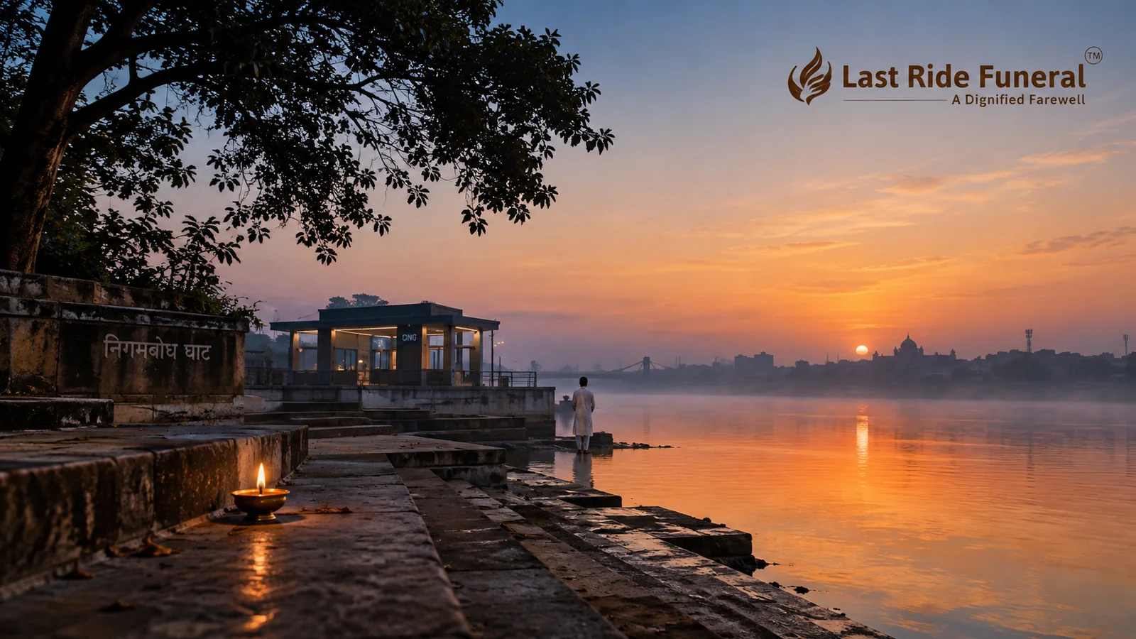 Pre-dawn view of Nigambodh Ghat on the Yamuna, Civil Lines Delhi — hero banner for Last Ride Funeral end-to-end Nigambodh Shamshan Ghat service with next-morning asthi collection