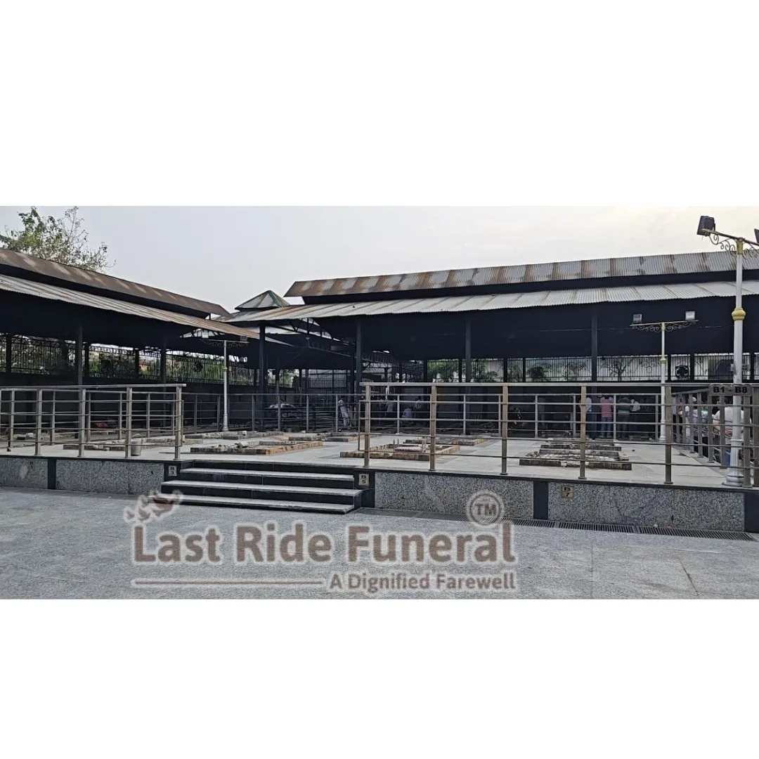 Punjabi Bagh Cremation Ground exterior view — PBCHS Moksha Dwar on Ring Road, East Punjabi Bagh, New Delhi 110026 — Last Ride Funeral Services