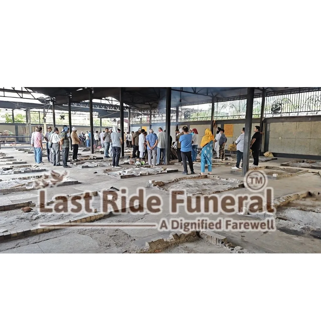 Punjabi Bagh Cremation Ground ceremonial area prepared by Last Ride Funeral Services — wood pyre platform with floral decoration, East Punjabi Bagh, New Delhi